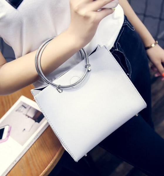 Free shipping 2019 Concentric ring personality shoulder handbag noble temperament bag