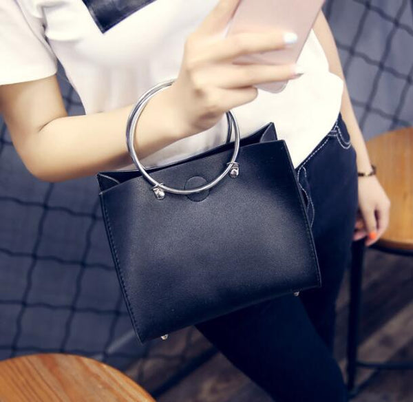 Free shipping 2019 Concentric ring personality shoulder handbag noble temperament bag